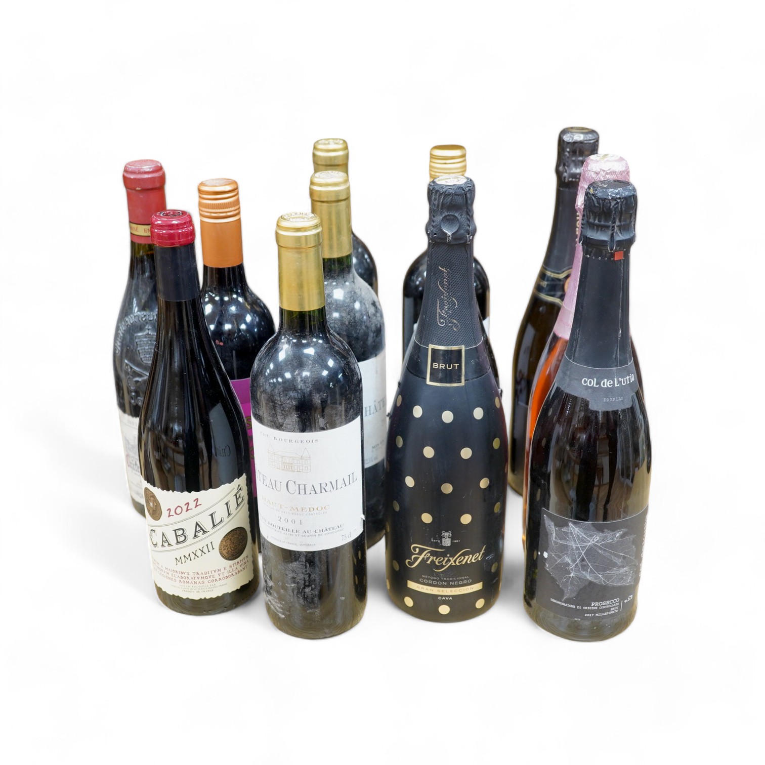 Twelve bottles of wine including; three bottles of Chateau Charmail 2001, a bottle of Chateauneuf-du-Pape 2001, a Cabalie 2022, a Brass Monkey 2019 Shiraz, Prosecco, etc. Condition - fair to good.